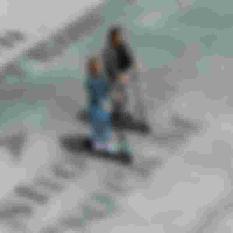 people riding scooters