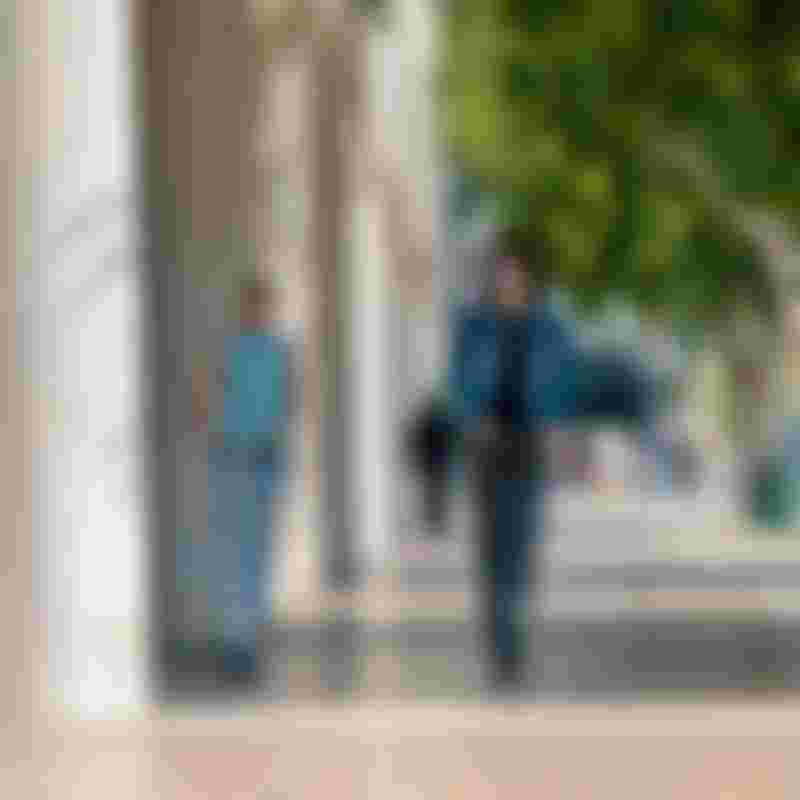 people riding scooters