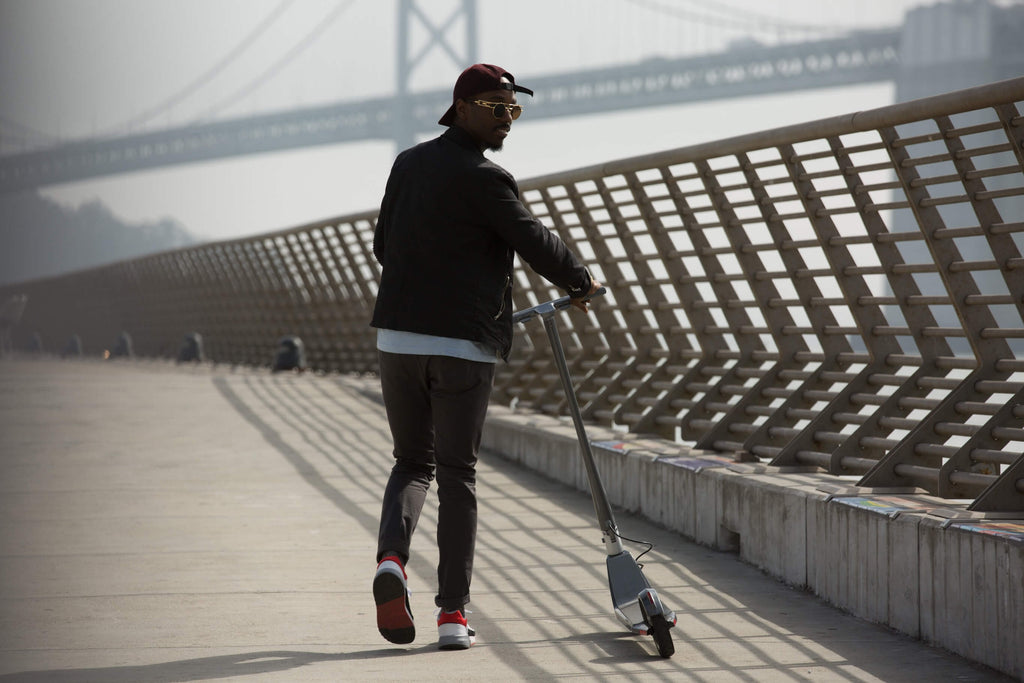 bridge-scooter-rider-city-black-man